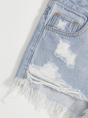 Light blue-white ripped denim shorts
